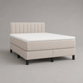 Letto matrimoniale boxspring 160 × 200 cm in tessuto beige con materasso, topper e testiera rettangolare
